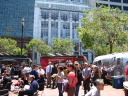 Off the Grid, a 
company that organizes food trucks, stations trucks every Thursday in 
Civic Center Plaza.  Here are a few of the trucks.  If you look at the 
full-sized image, you can read what kind of food each truck serves.
