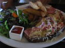 Di Yin's open-faced ham and gruyere sandwich accompanied with greens and 
steak fries.  The sandwich was good but too ham-y for me.  The fries 
were decent/good, marred by being a bit too crispy in my opinion.
