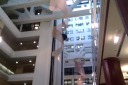 A video of the inside of the National Press building.  It appears to 
reside in the now-covered space between other buildings.  I like how I 
can see the guts of the building, in this case the girders and the 
workings of the elevators.  The spiral sculptures are also a nice touch.
