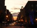Looking west at the sunset from near F and 9th Streets NW.  At right is 
Roy Lichtenstein's Modern Head.
