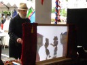 A movie of a shadow puppet performance.  The script has jokes; listen 
and you can hear one in this clip.

Oddly, I found watching the guy perform almost as interesting as 
watching the puppets themselves.  He's got style.
