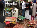 The neatest stand in the bazaar: Turkish carpets and lanterns.
