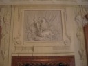 More.  (Another high-quality trompe l'oeil.)

At the bottom of the frame is the top of a fireplace.

