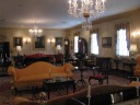 A simple shot of the Adams drawing room.  It has old-fashioned globes; 
one is visible in this picture.

