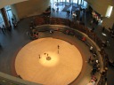 Kids playing in the central atrium.  Also, I like the sculpted metal 
that surrounds the area.
