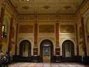 A panorama, taken as a video due to the low light conditions, of the 
third floor great hall.  It's highly decorated: reliefs, stained glass, 
tiled floor.  It's too bad not many people go up to this floor and get 
to see it.
