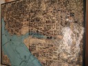 This map of Washington D.C.'s geography in 1800 has the location of 
modern buildings superimposed.  It really illustrates how much land has 
been recovered from water over the last two hundred years.
