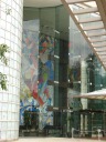 A huge graffiti-style mural in the lobby of a building, one of many 
pieces of art we spotted not on the art trail guide.
