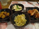 Panchan:

diakon - good, slightly sweet
tofu - appealingly mellow, soybean taste
kimchi - better than other place
bean sprouts - I saw worse than the other place; Di Yin says 
better

