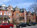 Back on Winchester Street, though it's subtle, notice how each of these 
houses has a different style banister.
