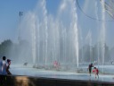 A close-up of people playing the fountain.
