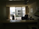 A view of the living room from the kitchen.
